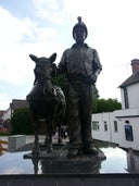 Scamp and Miner Statue