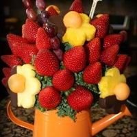 Photo taken at Edible Arrangements by Mario R. on 8/6/2012