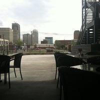 Photo taken at District Roof Top Bar and Grille by Jordan E. on 3/23/2012