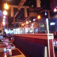 Photo taken at Red Robin Gourmet Burgers and Brews by Richard D. on 4/17/2012