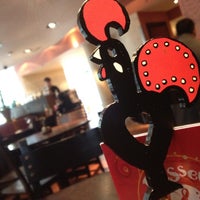 Photo taken at Nando&amp;#39;s by Jay M. on 4/4/2012