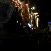 Photo taken at Danilas Resto Bar by Chantal B. on 8/5/2012