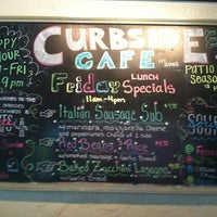 Photo taken at Curbside Cafe by Kenneth T. on 4/27/2012