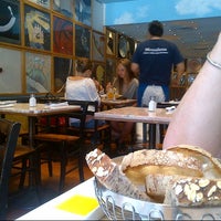 Photo taken at Mezzaluna Restaurants by Michael B. on 8/18/2012