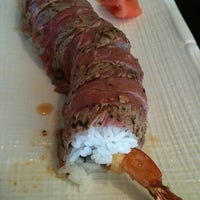 Photo taken at Sushi Hana Fusion Cuisine by Sean C. on 4/28/2012