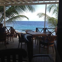 Photo taken at Scuba Lodge Boutique Hotel by Karen A. on 5/24/2012