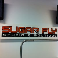Photo taken at Sugar Fly Studio &amp;amp; Boutique by Stephanie A. on 10/4/2011