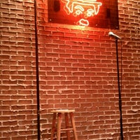 Photo taken at Crackers Comedy Club by Erin F. on 1/21/2012