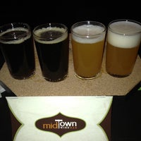 Photo taken at Midtown Wine Bar by Guy J. on 2/25/2012