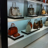 Photo taken at Michael Kors by m on 4/17/2012