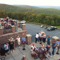 Photo taken at Roadies Restaurant and Bar by Tara E. on 8/16/2012