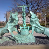 Photo taken at LUC Wolf and Kettle Statue by Sean O. on 4/4/2012