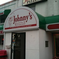Photo taken at Johnny&amp;#39;s Pizzeria &amp;amp; Restaurant by Derek on 4/16/2011