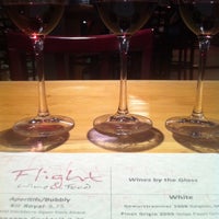 Photo taken at Flight Wine &amp;amp; Food by Lacey H. on 2/23/2012