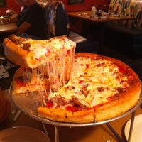 Photo taken at Chicago Pizza by Kyndra R. on 11/21/2011