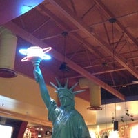 Photo taken at Red Robin Gourmet Burgers and Brews by Maria W. on 1/8/2012