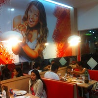 Photo taken at Domino&amp;#39;s Pizza by Julio A. on 7/28/2012