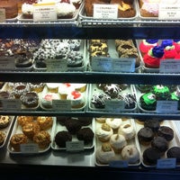 Photo taken at Crumbs Bake Shop by Jonell D. on 2/4/2011