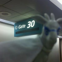 Photo taken at Gate 30 by Javier M. on 2/27/2012