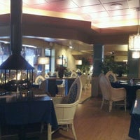 Photo taken at Las Brisas Restaurant by Sara W. on 1/28/2012