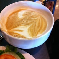 Photo taken at Village Coffee Roastery by Eric K. on 8/18/2011