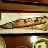 Photo taken at 焼魚食堂 魚角 大久保店 by Koichi I. on 10/21/2011