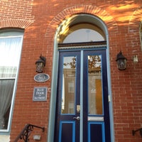 Photo taken at Blue Door On Baltimore by Melanie M. on 5/18/2012