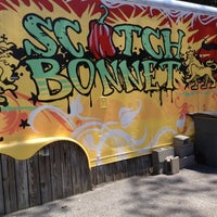 Photo taken at Scotch Bonnet Jamaican Eatery by Cryss S. on 4/28/2012