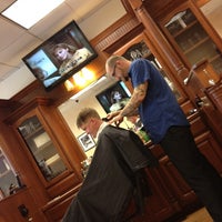 Photo taken at Roosters Men&amp;#39;s Grooming Center by Kirby T. on 7/7/2012