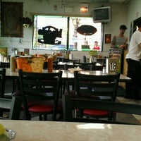 Photo taken at Taqueria Los Comales Logan Square by Meowser K. on 6/16/2012