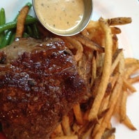 Photo taken at Steak Frites St-Paul by Kelly L. on 6/12/2012