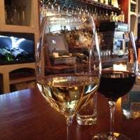 Photo taken at The Tangled Vine Wine Bar &amp;amp; Kitchen by Marie D. on 4/5/2012
