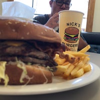 Photo taken at Nick&amp;#39;s Burgers by Mike T. on 8/4/2018
