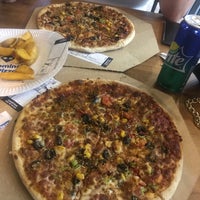 Photo taken at Domino&amp;#39;s Pizza by Melih Şah Ö. on 4/26/2018