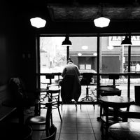 Photo taken at Toronto Coffee and Tea House by Chris S. on 2/12/2013