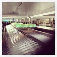 Photo taken at Baggage Claim by Max A. on 12/16/2012