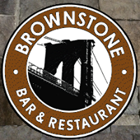 รูปภาพถ่ายที่ Brownstone Bar &amp; Restaurant โดย Brownstone Bar &amp; Restaurant เมื่อ 11/18/2014