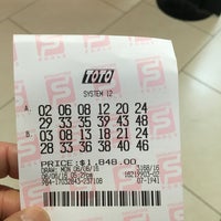 Photo taken at Singapore Pools @ Lucky Plaza by Shinya I. on 6/6/2016