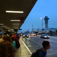 Photo taken at Gate 35 by Andrea P. on 8/4/2014