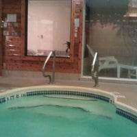 Photo taken at Sybaris Pool Suites by Anita S. on 12/15/2012