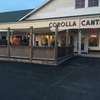 Photo taken at Corolla Cantina Bar and Grill by Michael D. on 6/1/2017