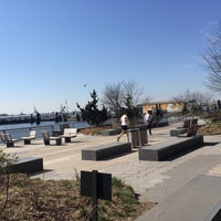 Photo taken at East River Esplanade South Dog Run by Mona H. on 4/18/2015