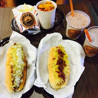 Photo taken at Gourmet Hotdog Cafe by Alif M. on 1/10/2015