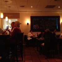 Photo taken at Lucca Restaurant by Kim S. on 1/27/2013