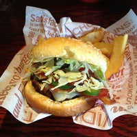 Photo taken at Red Robin Gourmet Burgers and Brews by Brandon L. on 5/23/2013