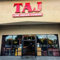 Photo taken at Taj Fine Indian Cuisine by Ross on 10/5/2018