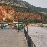 Photo taken at Kalkan Beach by Umut A. on 2/8/2018