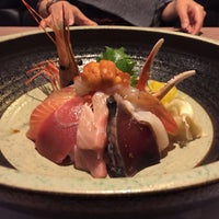 Photo taken at Sushi Kuu by roger w. on 1/1/2015