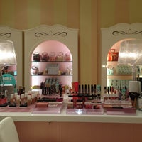 Photo taken at Benefit Cosmetics by Emily K. on 12/19/2012