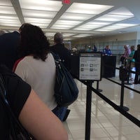 Photo taken at South Security Checkpoint by Kimberly W. on 7/10/2014